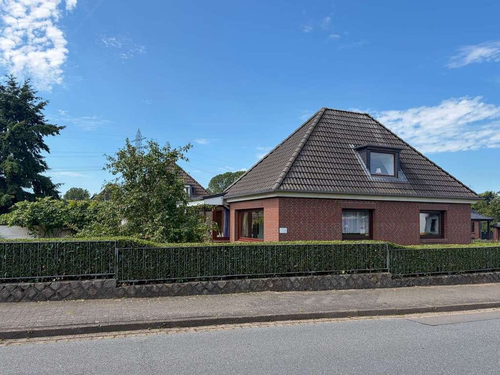 Immobilie in Schacht-Audorf - Solides Einfamilienhaus mit Keller und Garage in zentraler Lage - Bild 1