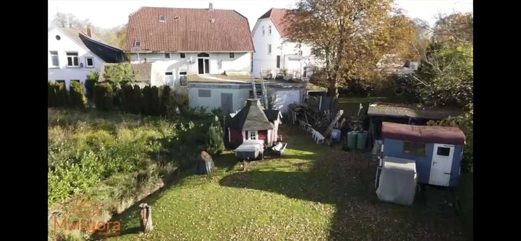 Immobilie in Butjadingen - Schönes Mehrfamilienhaus mit Vergangenheit und Zukunft - Bild 2