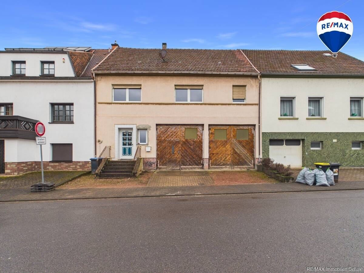 Immobilie in Dillingen/Saar - Wohnen & Hobby vereint: Haus mit großzügiger Werkstatt und Potenzial - Bild 0