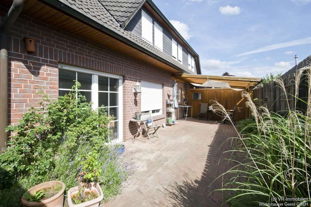 Immobilie in Hatten - Doppelhaushälfte in Wohneigentum mit Garage in ruhiger Lage in Sandkrug - Bild 0