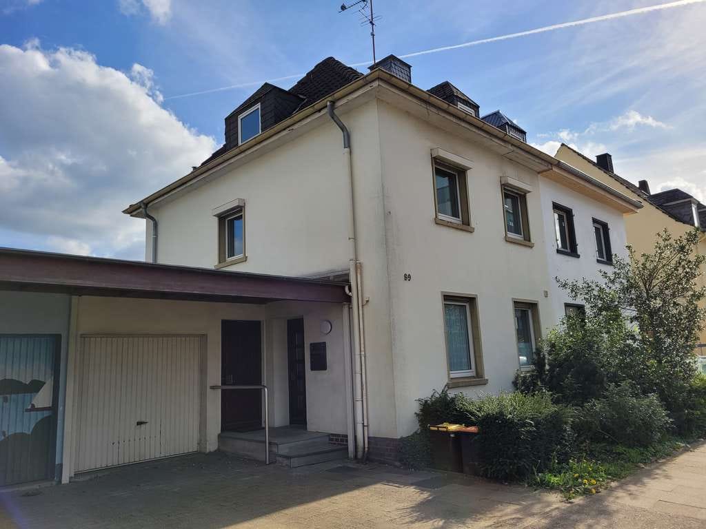 Immobilie in Heiligenhaus - Familienfreundliche Doppelhaushälfte mit sonnigem Garten, Balkon und Dachterrasse - Bild 0
