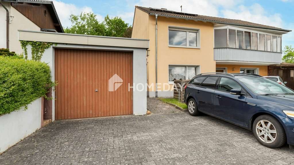 Immobilie in Neuhof - Charmantes EFH mit Wintergarten, großem Garten & viel Potenzial in familienfreundlicher Lage - Bild 1