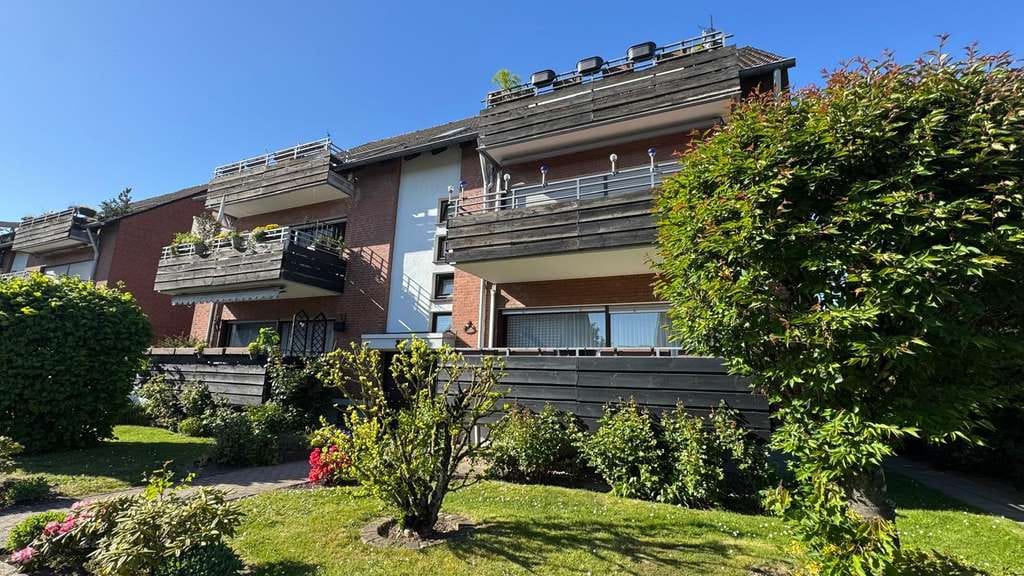 Immobilie in Moers - traumhafte Maisonette-Wohnung mit großzügigem Balkon & Garage - Bild 0