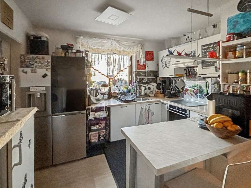 Immobilie in Breisach am Rhein - Voll vermietetes Vier-Parteien-Haus in guter Lage von Breisach-Gündlingen - Bild 4