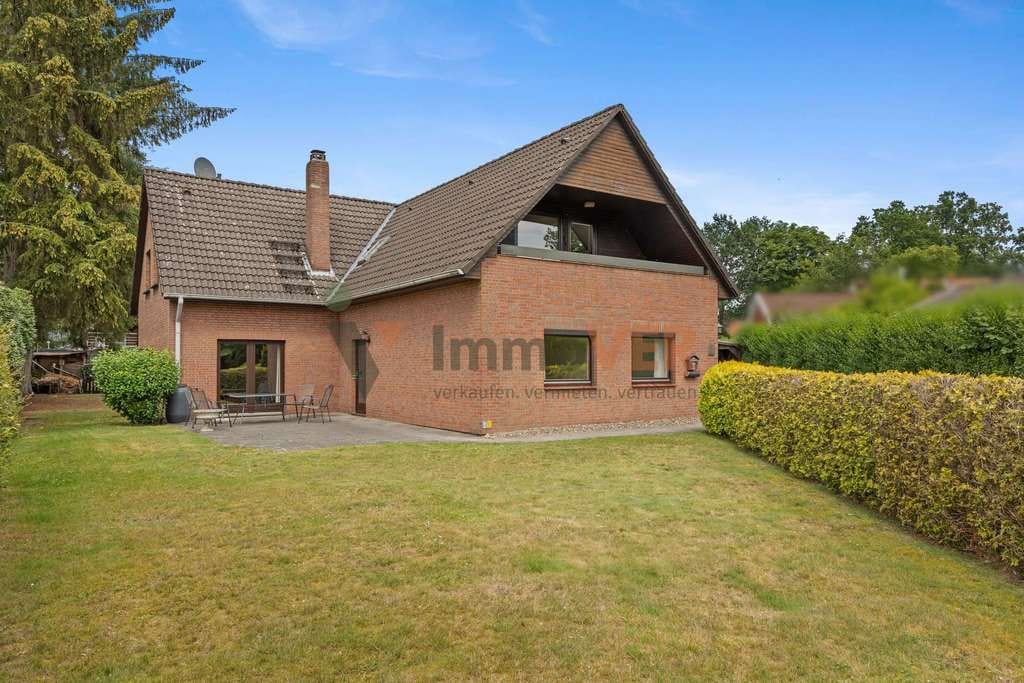 Immobilie in Lilienthal - Großzügiges Zweifamilienhaus mit Einliegerwohnung auf ca. 1.100 m² Grundstück in Lilienthal - Bild 0