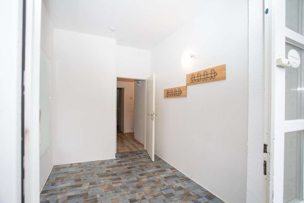 Immobilie in Übach-Palenberg - Mehrfamilienhaus mit 3 Wohnungen + Ladenlokal mit eigenen Grundbüchern - Bild 4
