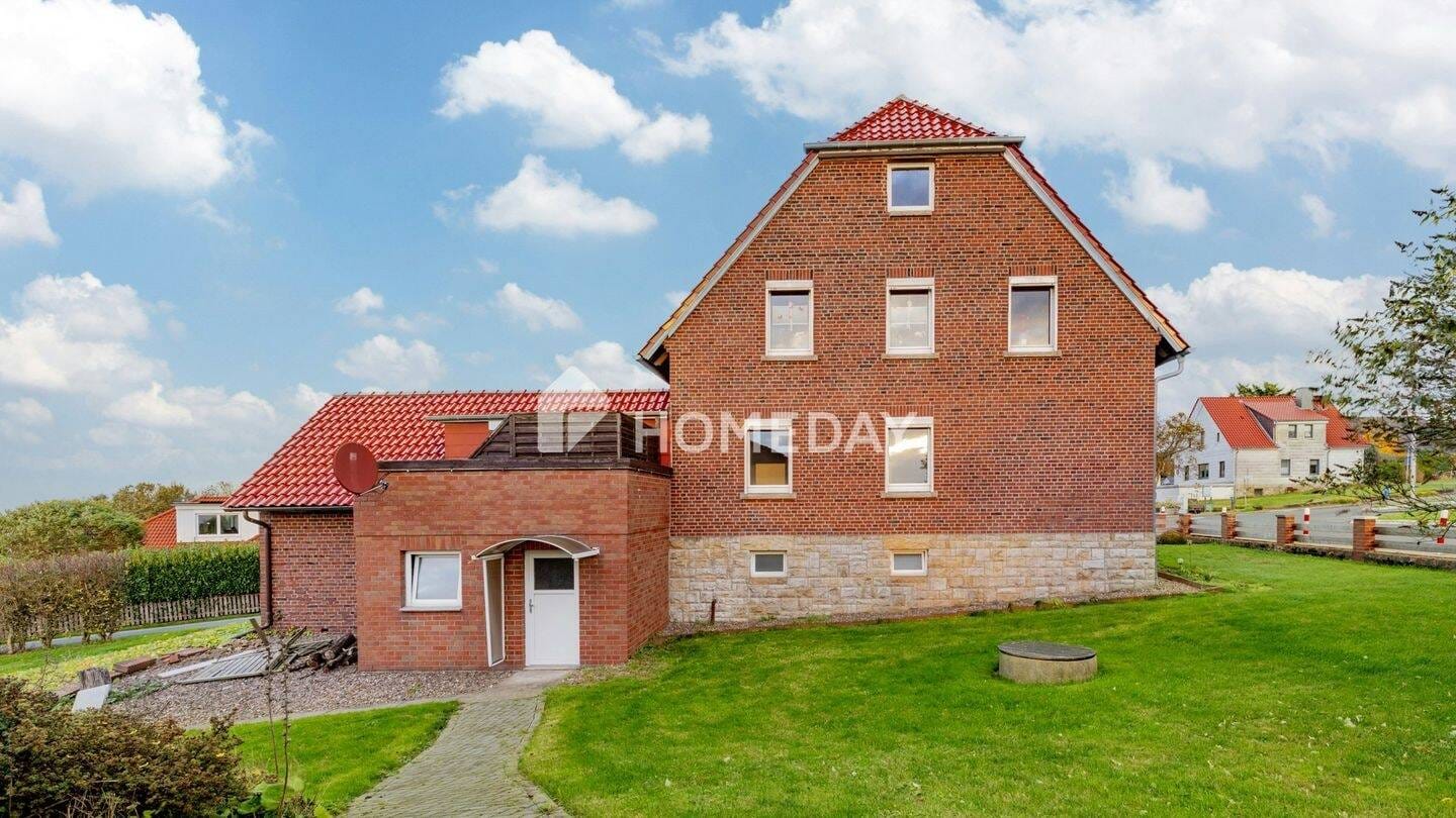 Immobilie in Obernkirchen - Charmantes Zweifamilienhaus mit Garten, Garagen in Obernkirchen - Bild 2