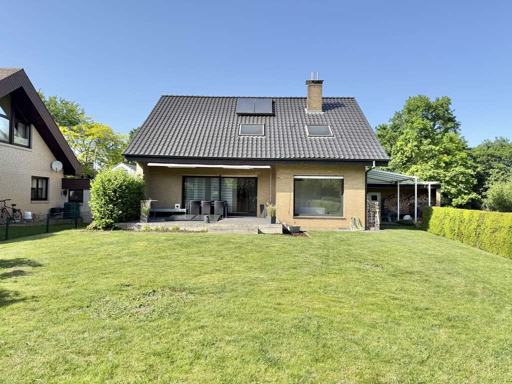 Immobilie in Ennigerloh - Modernisiertes Einfamilienhaus mit Loft-Charakter in ruhiger Sackgassenlage von Ostenfelde - Bild 1