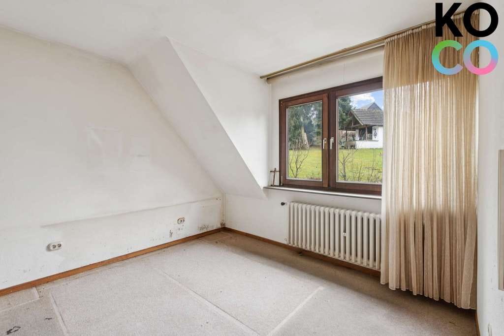 Immobilie in Heiligenhaus - Dreifamilienhaus mit großem Garten, Garage & Ausbaupotenzial–attraktive Gelegenheit in Heiligenhaus - Bild 2