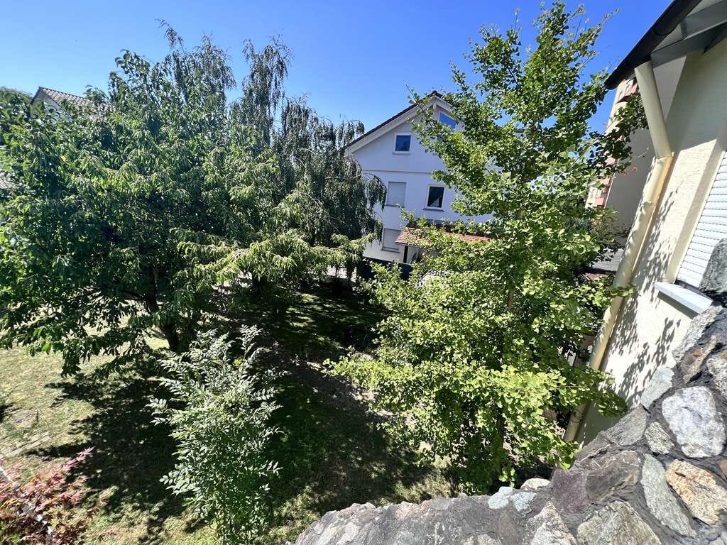 Immobilie in Baienfurt - Elegante Wohnung mit Kamin, Südbalkon und Garten – Perfekte Mischung aus Ruhe und urbaner Nähe! - Bild 2