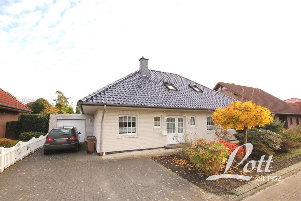Immobilie in Apen - +++ Großzügiger Bungalow mit Garage in familienfreundlicher Wohnlage in Augustfehn! +++ - Bild 1