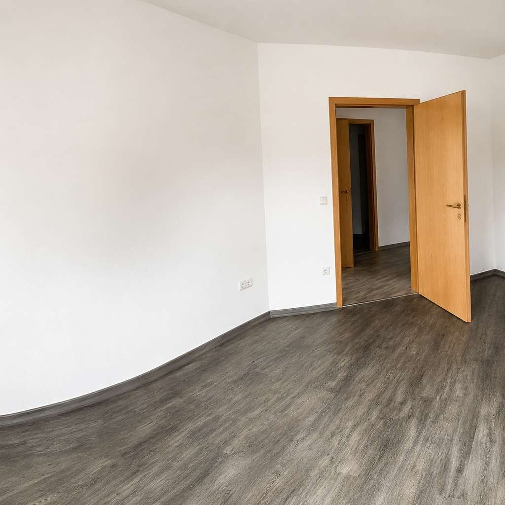 Immobilie in Bad Liebenstein - Kapitalanlage: vermietete 2-Zimmer-Mansardwohnung mit Balkon & Tiefgarage - Bild 3