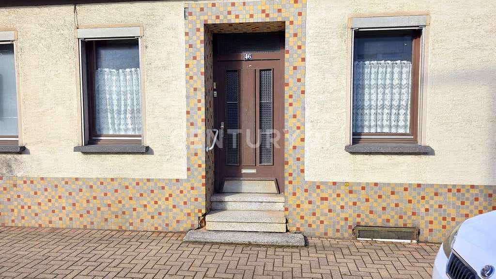 Immobilie in Spiesen-Elversberg - Freistehendes Einfamilienhaus mit Einliegerwohnung und zusätzlichem großem Baugrundstück in Spiesen - Bild 3