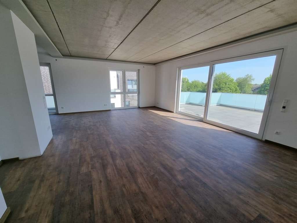 Immobilie in Lembruch - Wohnen, da wo andere Urlaub machen! KfW 55 Effizienzhaus - Penthouse-Eigentumswohnung mit großer Dac - Bild 1