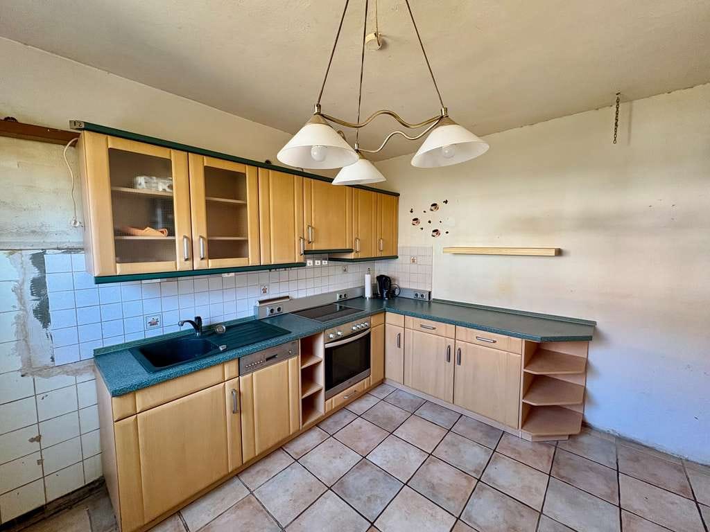 Immobilie in Nienburg/Weser - Reihenmittelhaus mit Balkon, Terrasse und Garten in Langendamm – ideal für Familien! - Bild 2