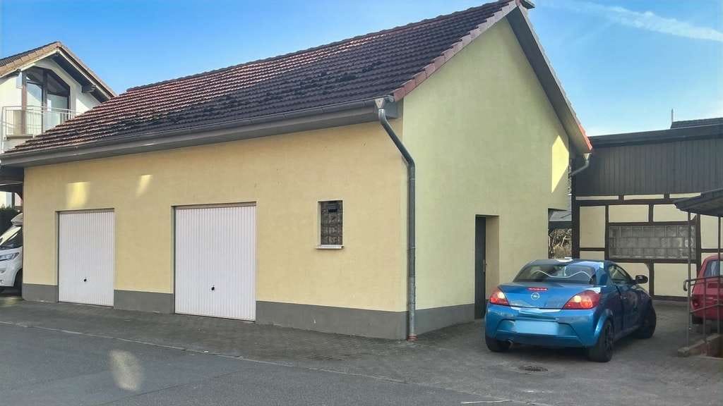 Immobilie in Hann. Münden - Kapitalanlage in Hann. Münden, OT Gimte, Mehrfamilienhaus mit zwei Garagen, voll vermietet - Bild 4