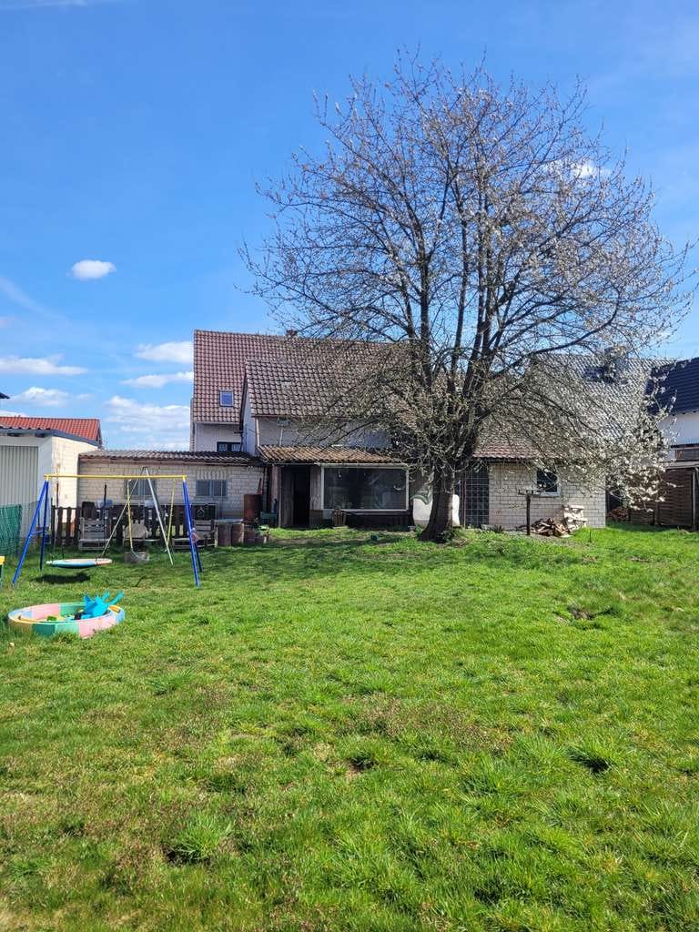 Immobilie in Bodenfelde - * Freistehendes Einfamilienhaus in Wahmbeck * Wfl. ca. 155 m² * GS. ca. 1002 m² * 2 Garagen * - Bild 1
