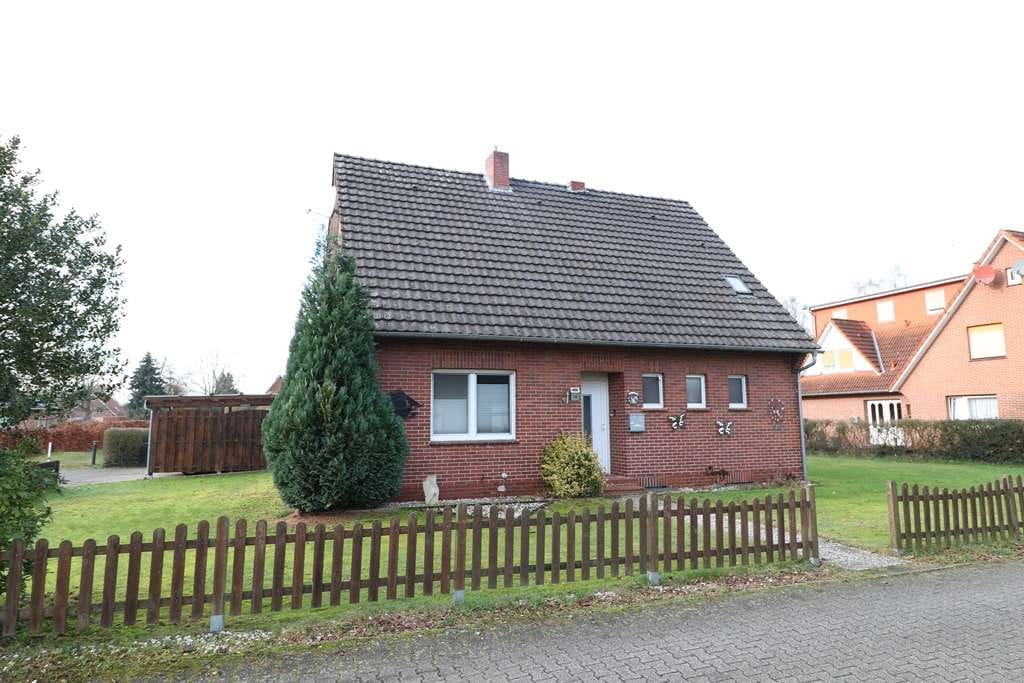 Immobilie in Essen/Oldenburg - Sehr gepflegtes, teilmodernisiertes Wohnhaus mit Keller, Garage, Carport und großem Garten - Bild 0