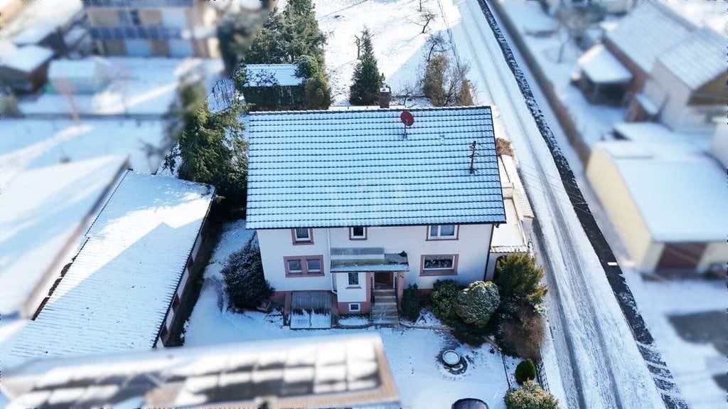 Immobilie in Wertheim - Großzügiges Baugrundstück mit Garage und Altbestand - Bild 1