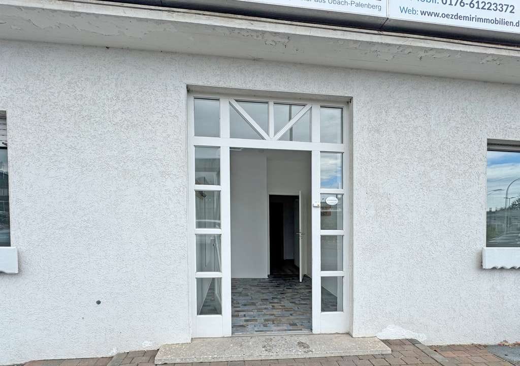 Immobilie in Übach-Palenberg - Mehrfamilienhaus mit 3 Wohnungen + Ladenlokal mit eigenen Grundbüchern - Bild 3