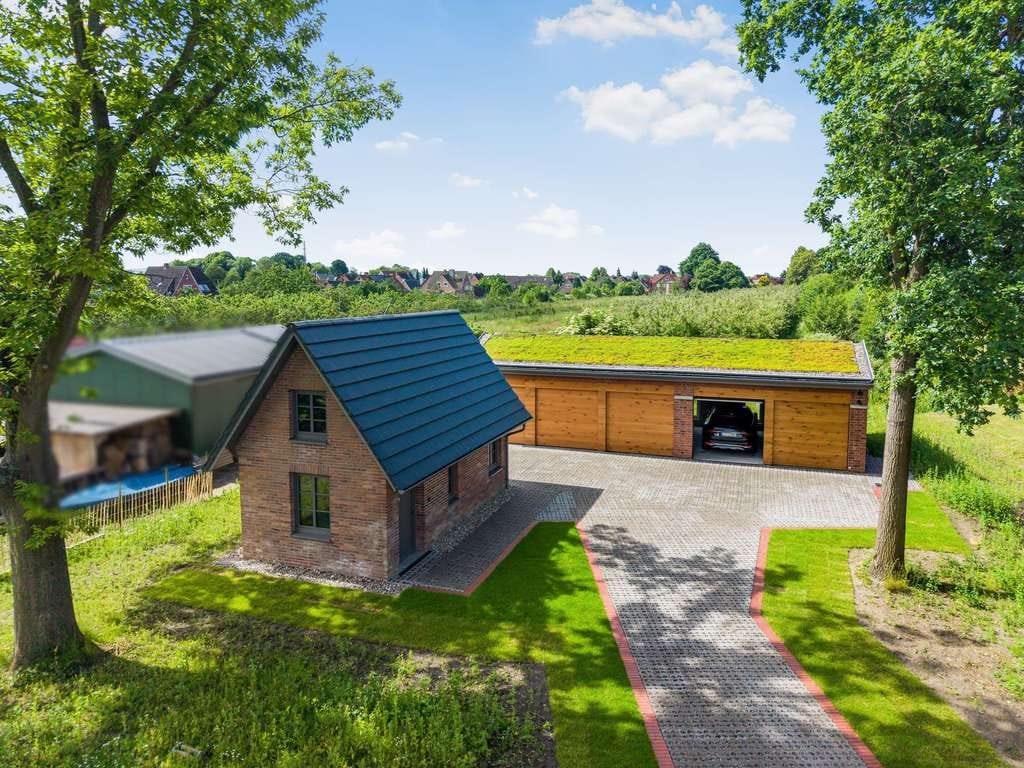 Immobilie in Grünendeich - Elbblick. Architektur. Komfort. – außergewöhnliches Wohnen im Alten Land - Bild 4