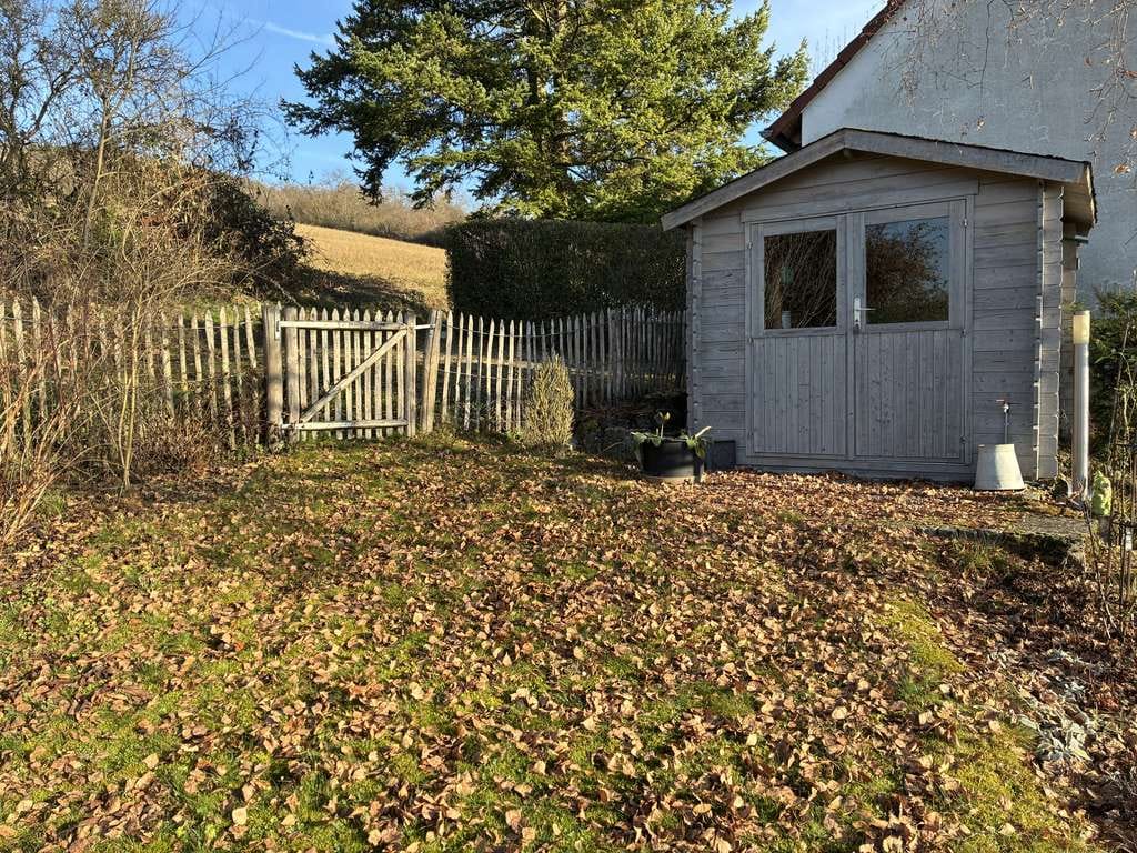 Immobilie in Lauda-Königshofen - Charmantes Einfamilienhaus mit Traumgarten am Dorfrand von Unterbalbach - Bild 3