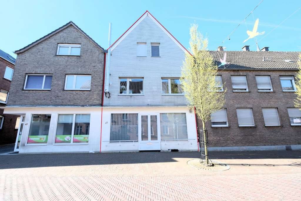 Immobilie in Kranenburg - Energieeffizientes Wohn- und Geschäftshaus mit großer Dachterrasse - Bild 0
