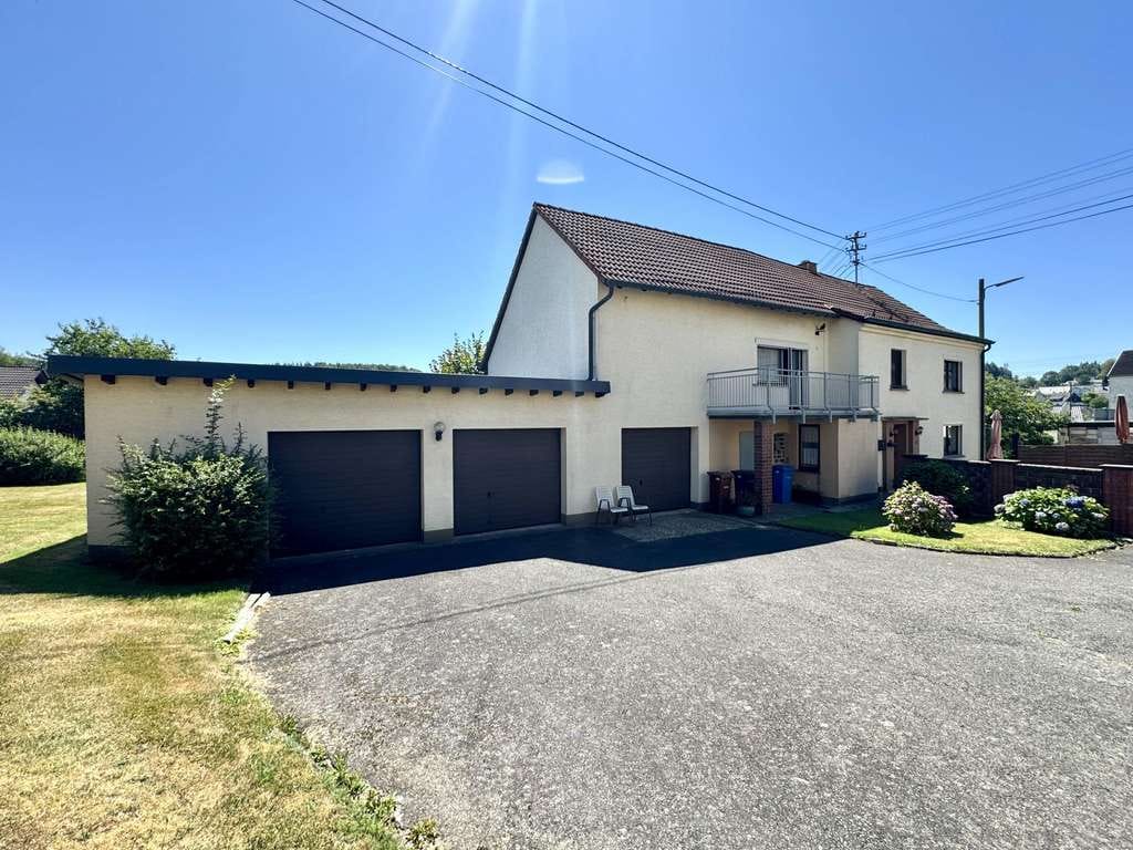 Immobilie in Dürrholz - Einfamilienhaus mit drei Garagen in ruhiger Lage - Bild 1