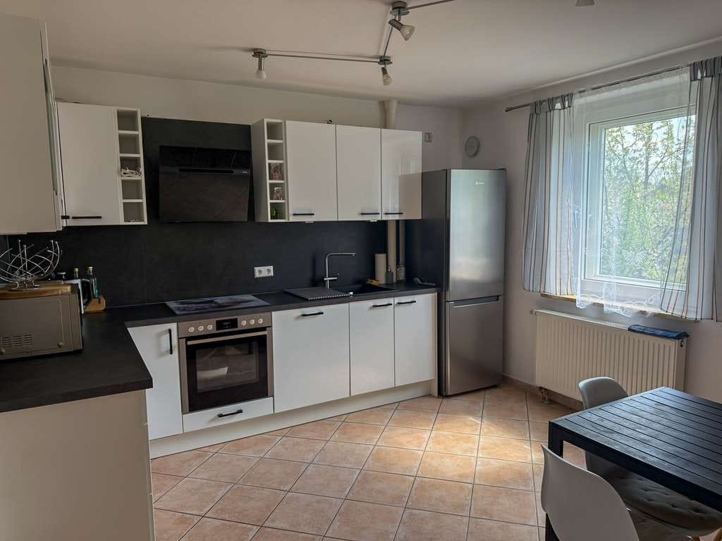 Immobilie in Untermeitingen - Renovierte 2 Zimmer-Hochparterre-Wohnung mit ca. 230 m² großem Garten - Bild 2