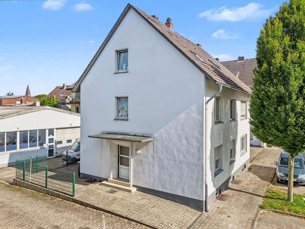 Immobilie in Beckum - Mehrfamilienhaus mit 3 Wohneinheiten, Garage und Entwicklungspotenzial in Beckum - Bild 1