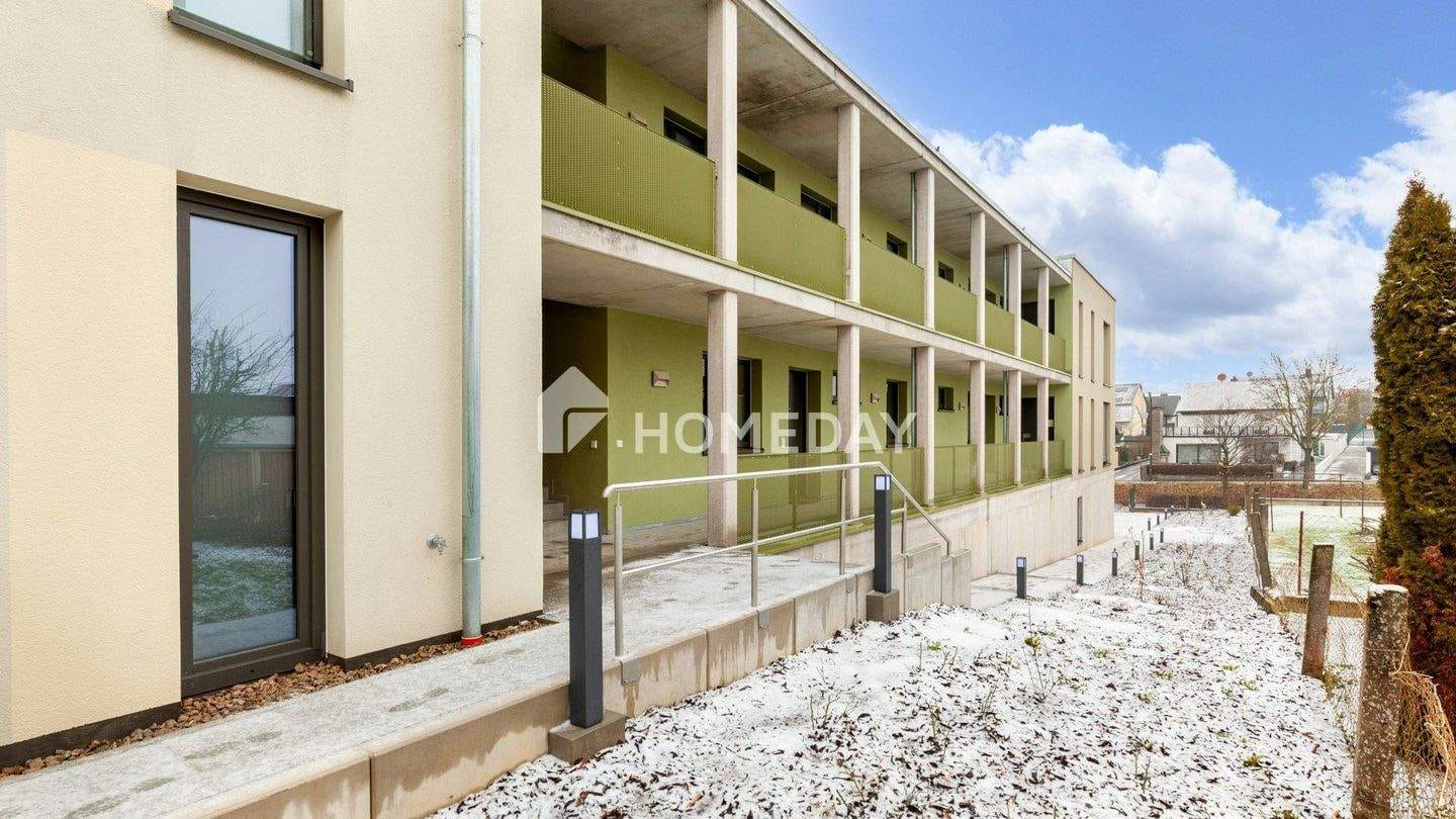 Immobilie in Kürnach - Neubau/Erstbezug! Zwei-Zimmer-Wohnung mit überdachter Terrasse und Garten - Bild 1