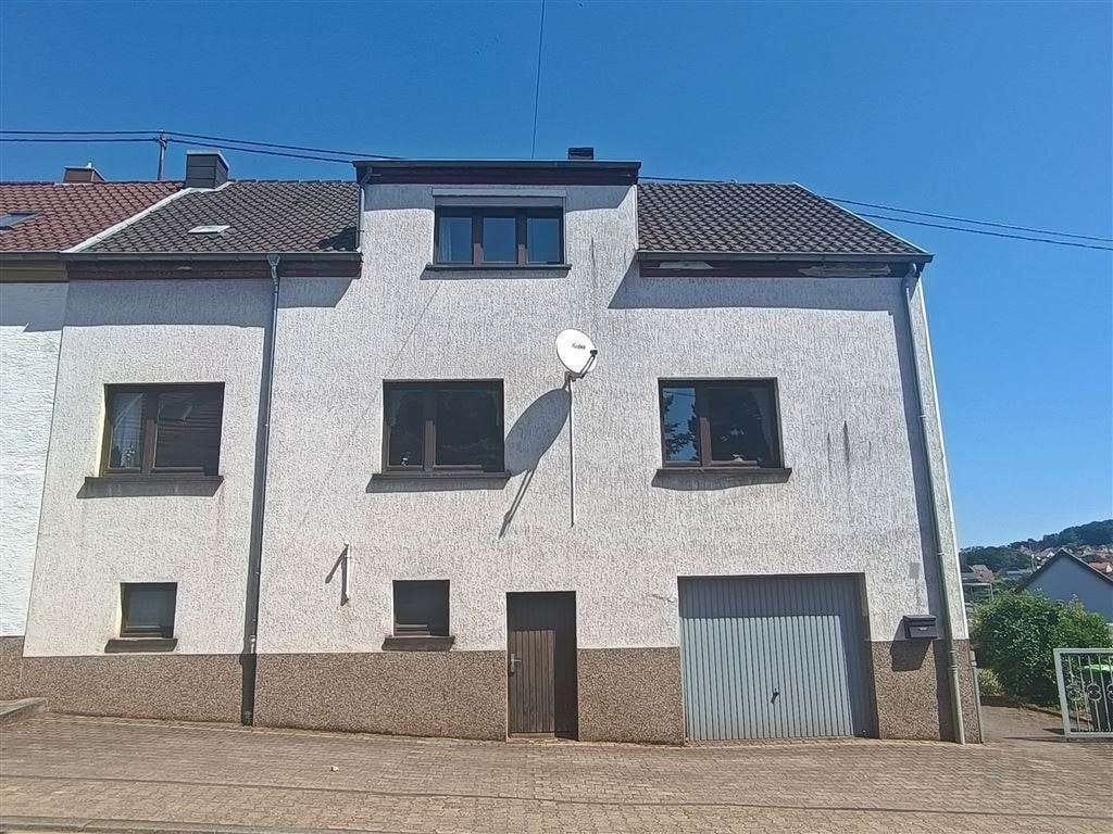 Immobilie in Merchweiler - Einseitig angebautes Einfamilienhaus mit schönem Grundstück - Bild 1