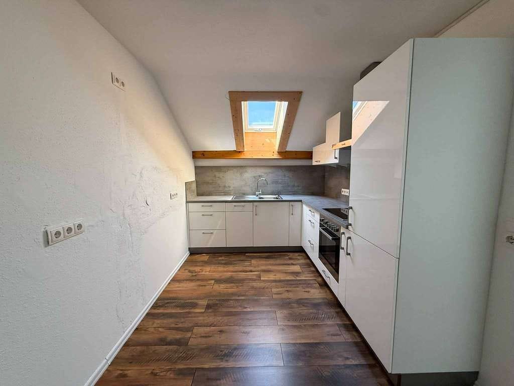 Immobilie in Siegsdorf - Gepflegte Dachgeschosswohnung mit Westbalkon - Bild 1