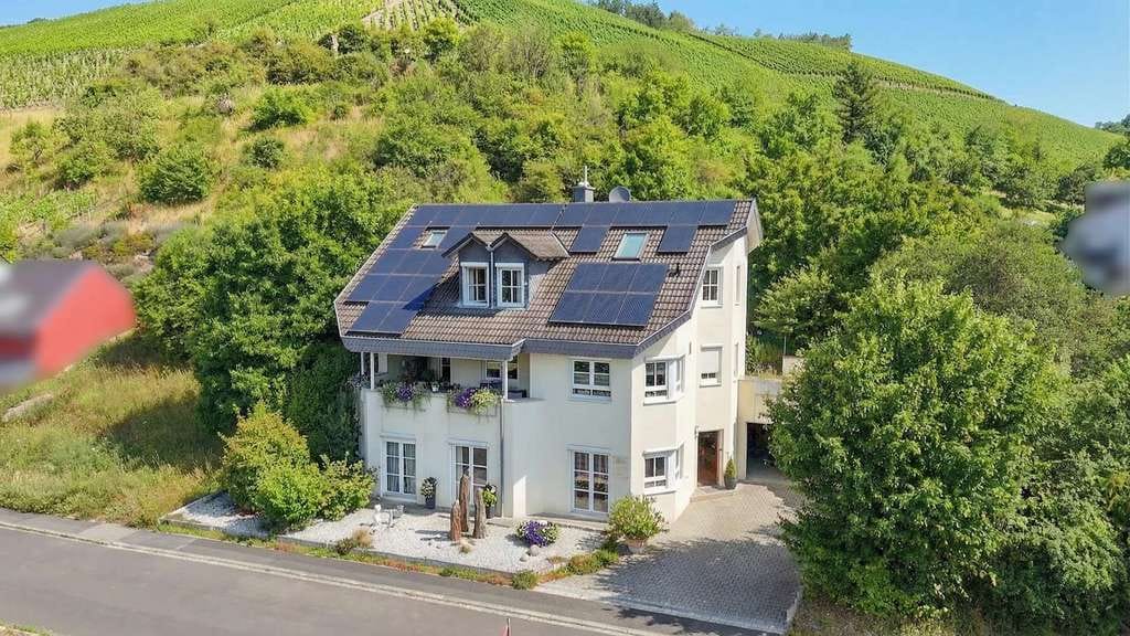 Immobilie in Retzstadt - Wohnen auf höchstem Niveau: Großzügiges Einfamilienhaus zum Preis einer ETW - Bild 1