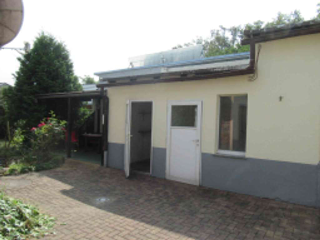 Immobilie in Dessau-Roßlau - DHH mit viel Wohnfläche und großer Werkstatt in Dessau-Roßlau zu verkaufen - Bild 3