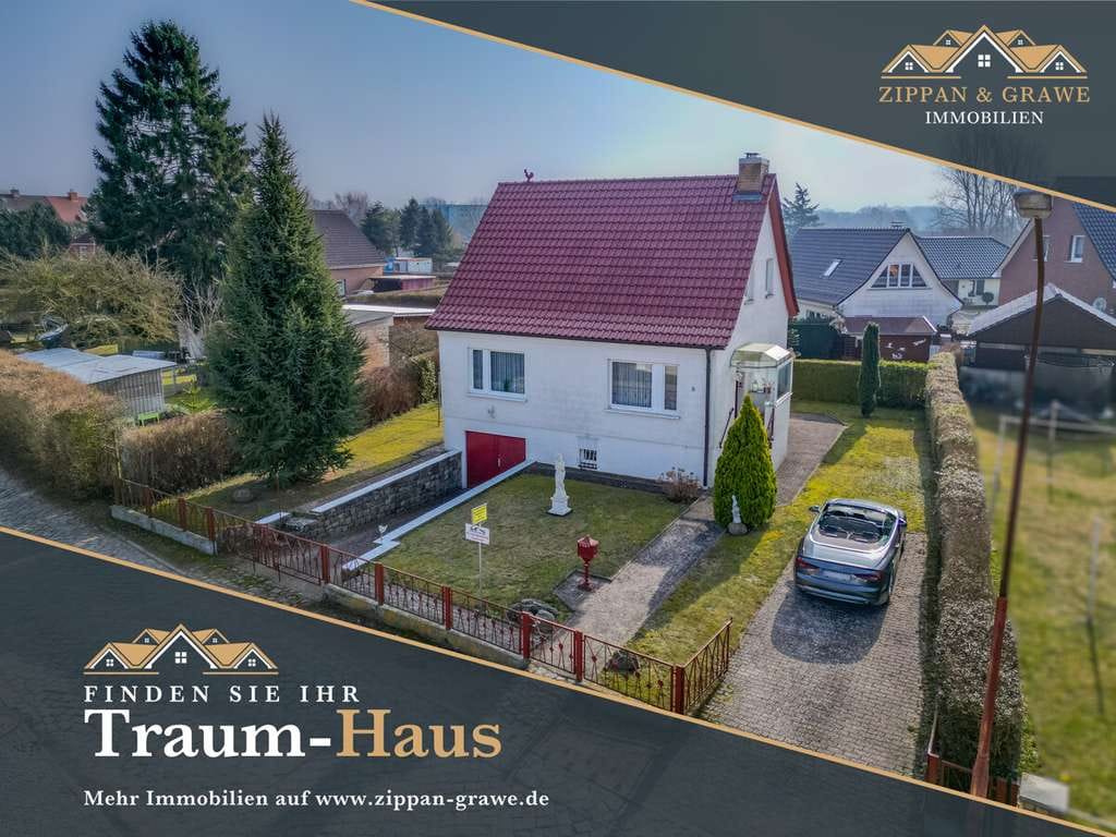 Immobilie in Barth - Wohnen in beliebter Lage - Ihr gepflegtes Einfamilienhaus mit großem Garten und Garage - Bild 0