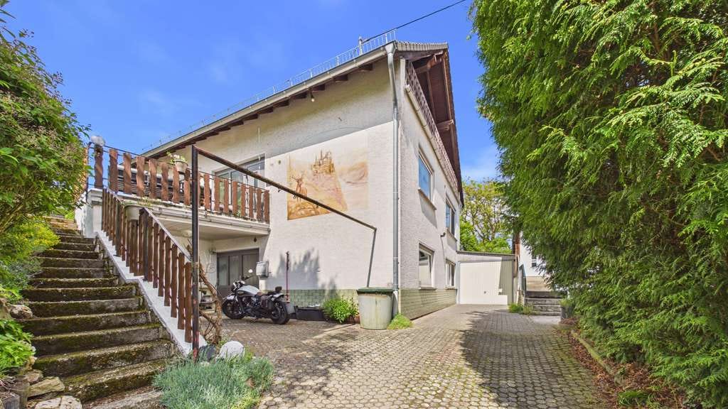 Immobilie in Lipporn - 205 m² Wohnkomfort auf 690 m² Grundstück – Zweifamilienhaus mit Gartenidylle - Bild 3