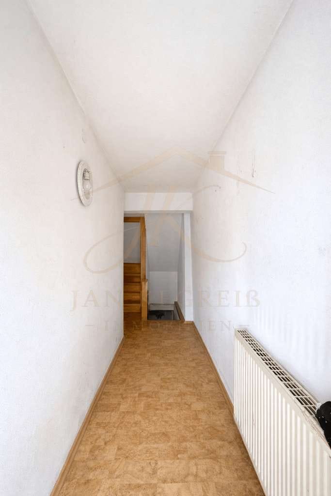 Immobilie in Haiterbach - Wohnen und Vermieten clever kombiniert: Zweifamilienhaus mit Ausbaureserve zur 3. Einheit - Bild 4