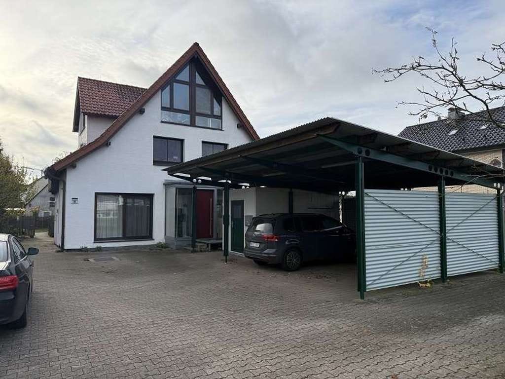 Immobilie in Hövelhof - Mehrfamilienhaus auf großem Grundstück in zentraler Lage von Hövelhof - Bild 2
