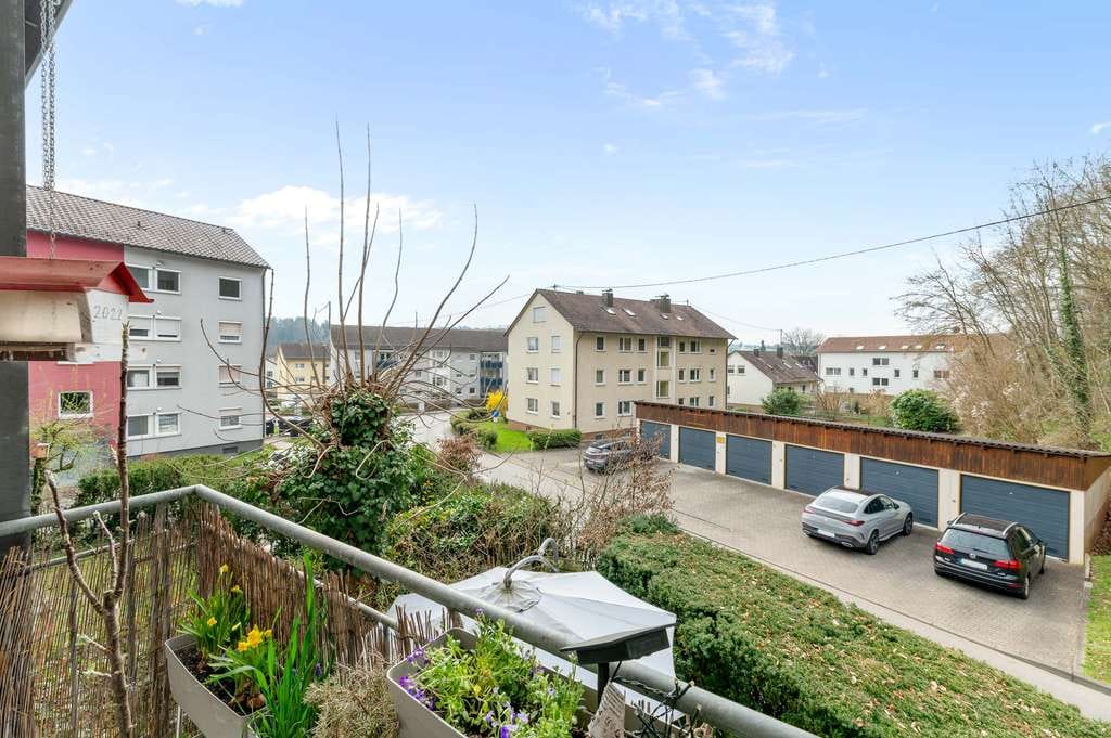 Immobilie in Neckartenzlingen - Gepflegte 3,5-Zimmer-Wohnung mit Südbalkon & TG-Stellplatz - Bild 4