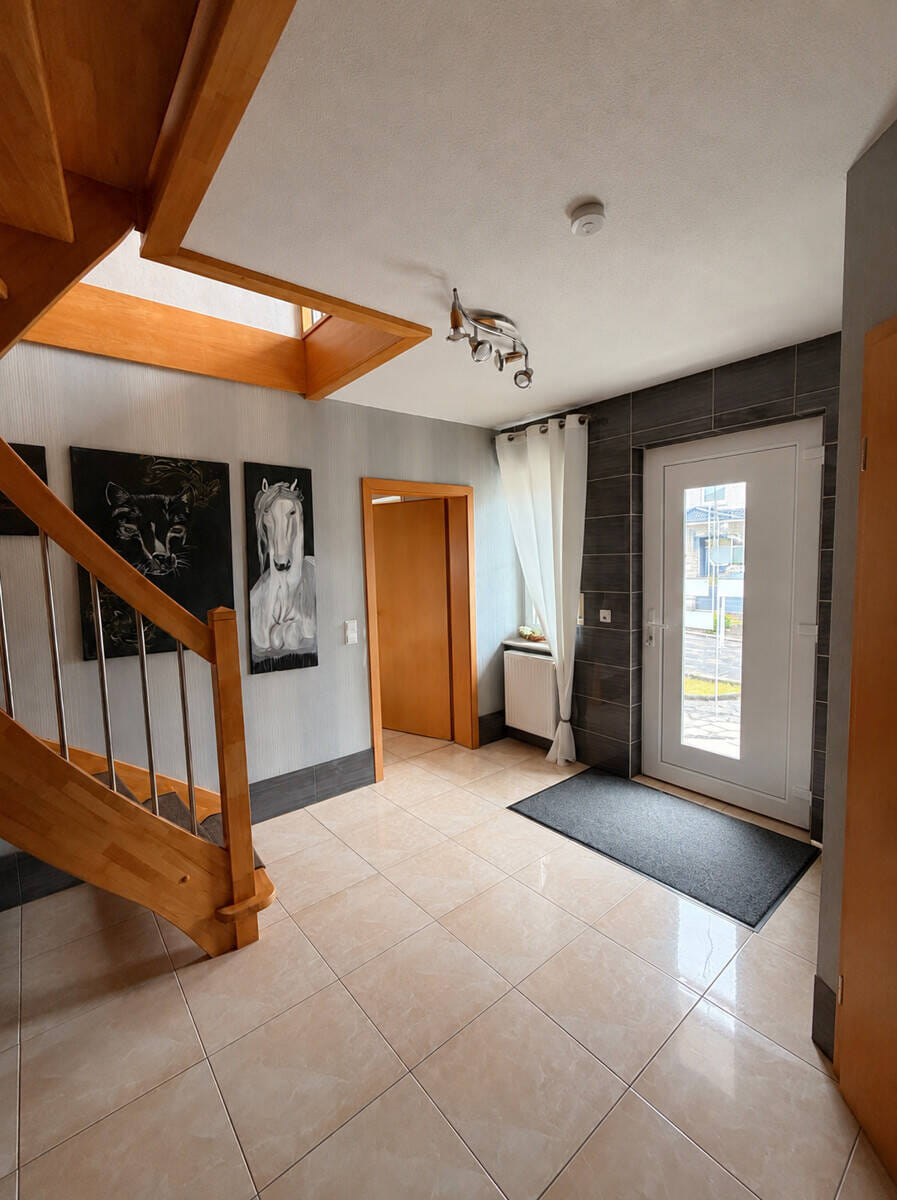 Immobilie in Dinklage - Ein Ort zum Aufwachsen! Einfamilienhaus  auf großem Grundstück  in familienfreundlicher Wohnlage - Bild 2