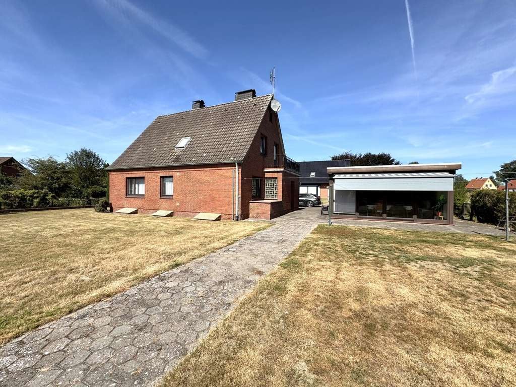 Immobilie in Schiffdorf - Schiffdorf-Geestenseth: Viel Platz & viel Potenzial - Ein/Zweifamilienhaus auf 1.142 m² mit Winterga - Bild 2
