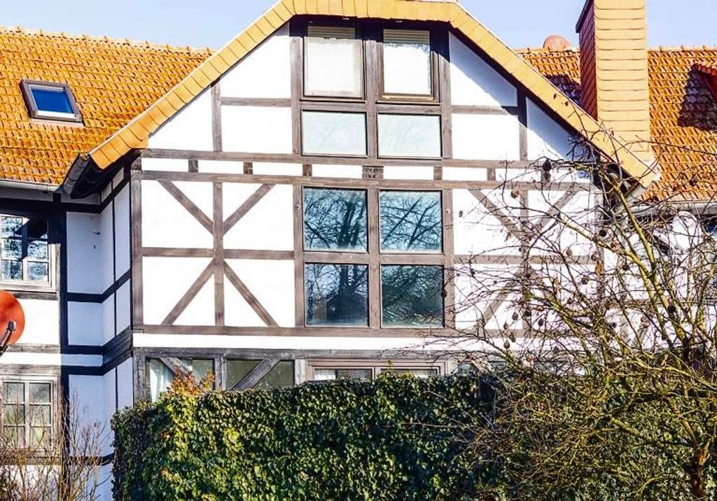 Immobilie in Künzell - Stilvolles Wohnen im historischen Gutshof – Besonderes Reihenmittelhaus mit Galeriecharakter - Bild 1