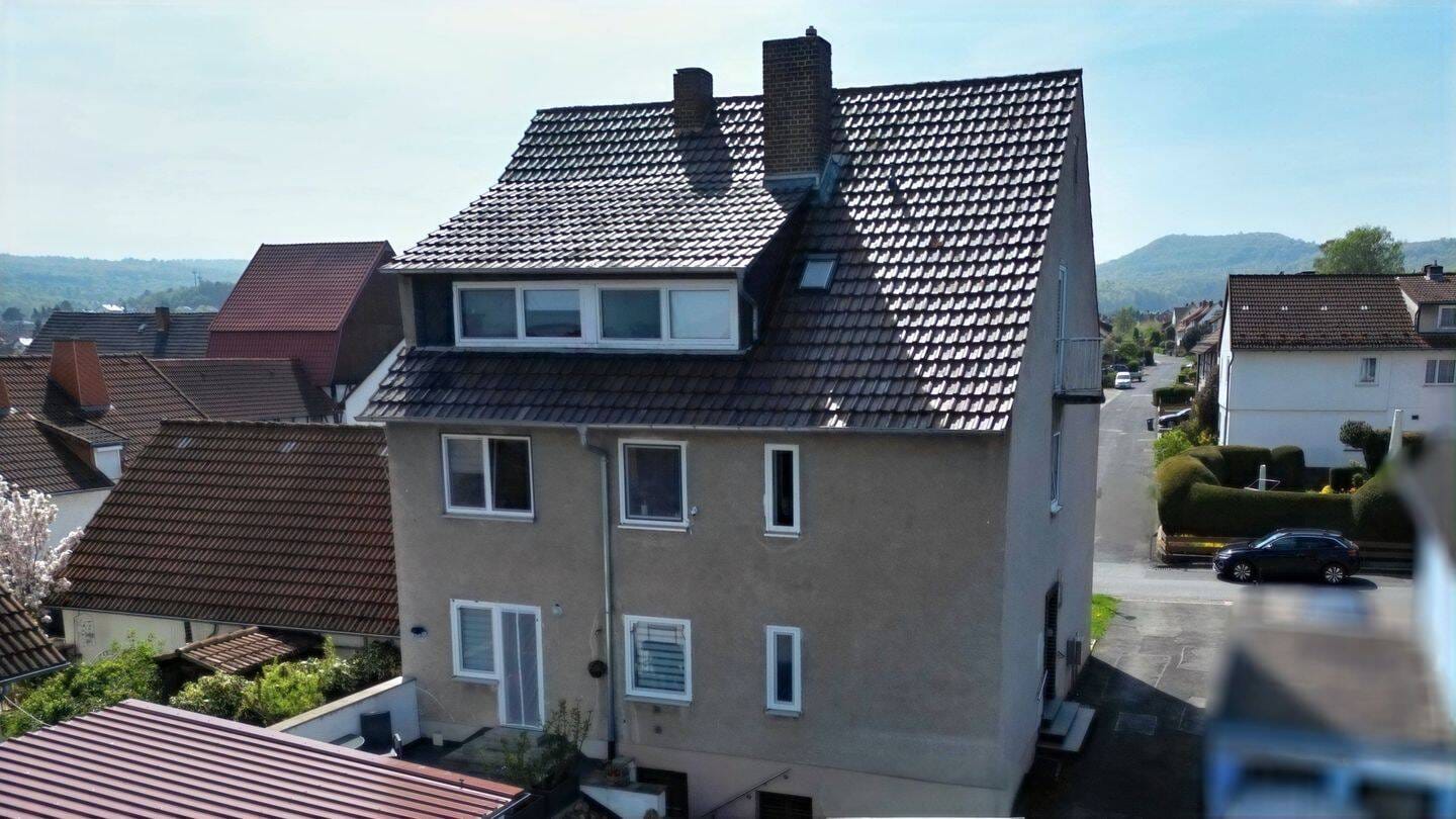 Immobilie in Ahnatal - Solides Mehrfamilienhaus mit stabiler Vermietung und attraktivem Grundstück in Ahnatal - Bild 1