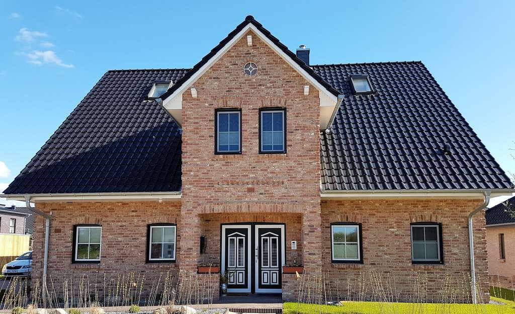 Immobilie in Hartenholm - Nordisches Flair - Ihr Kapitänshaus in Hartenholm  Niedrigenergiehaus EH40 mit Wärmepumpe & PV-Anlage -  Neubauplanung - Bild 1