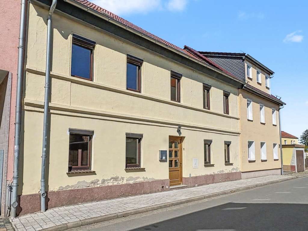 Immobilie in Eilenburg - Zentral gelegenes Reihenmittelhaus mit Entwicklungspotenzial und Innenhof in Eilenburg - Bild 1