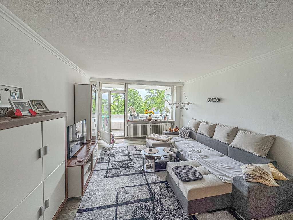 Immobilie in Grömitz - Attraktive Kapitalanlage – Vermietete 2-Zimmer-Wohnung mit Balkon und teilweisem Meerblick! - Bild 1