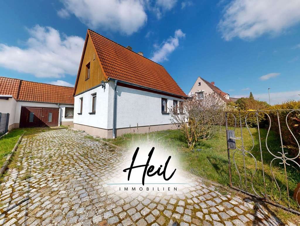 Immobilie in Zwenkau - Einfamilienhaus mit Garten, Terrasse und Garage auf Erbbaugrundstück - Bild 0