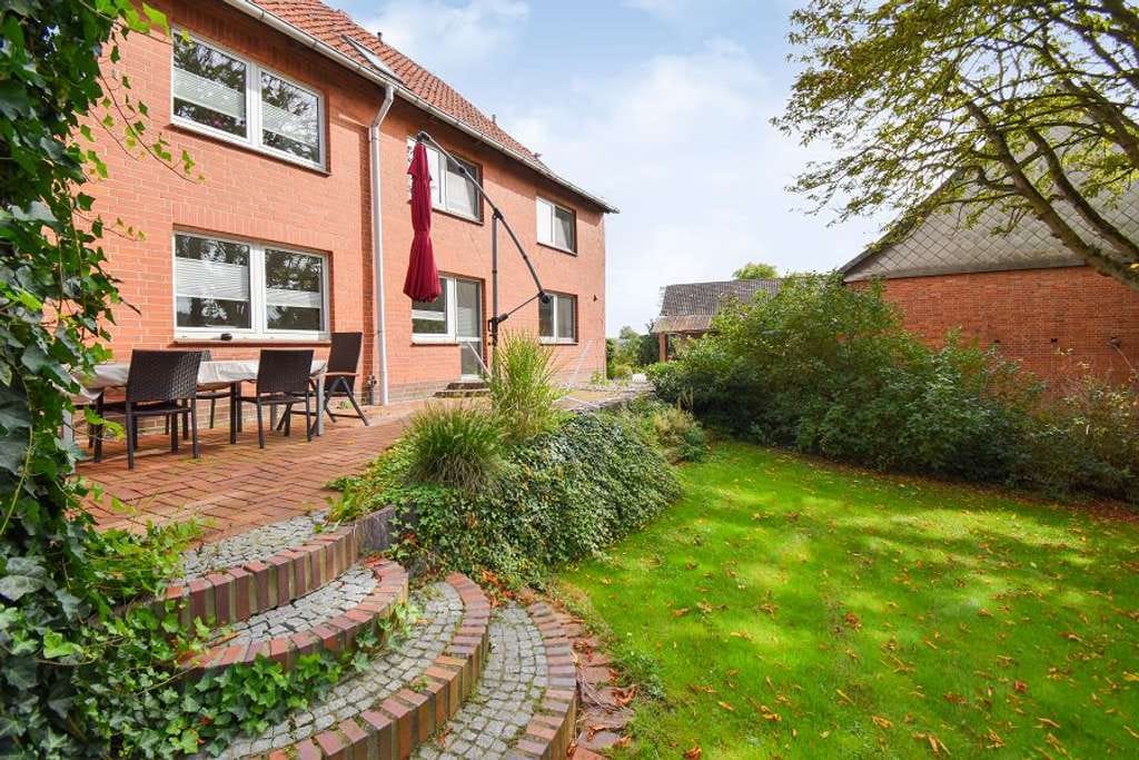 Immobilie in Holle - Charmantes Ein-Zweifamilienhaus über drei Etagen! - Bild 0