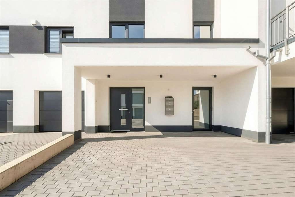 Immobilie in Kenn - Barrierefreie Neubauwohnung mit hochwertiger Ausstattung und zwei Stellplätzen auf der Kenner Ley - Bild 2